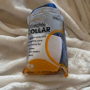 Inflatable Collar - Blue. Size large. Sizes on back of the package. New.